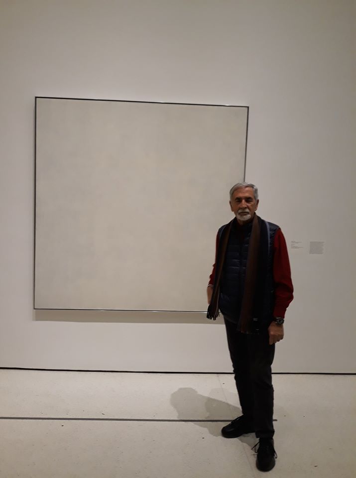Christos Kontaroudis in front of an Art Work